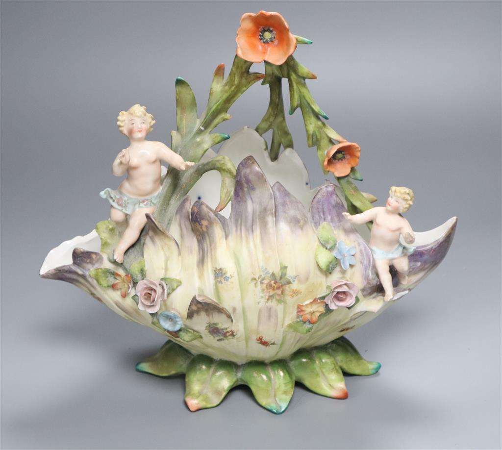 A Victorian Royal Worcester figural centrepiece, 20cm high, restored, an Austrian serving dish with central seated maiden, and a Contin
